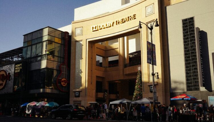 A vibrant scene outside the iconic Dolby Theatre in Hollywood, featuring a bustling crowd and festive decorations., tags: 2026 - pexel