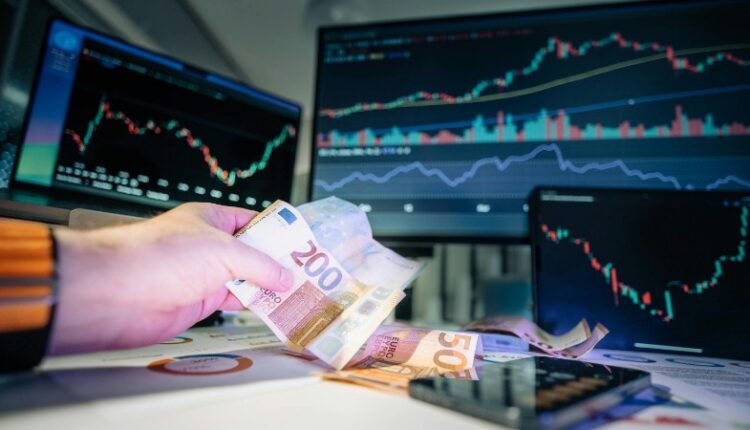Close-up of euro banknotes with financial market graphs in the background, depicting finance and investment themes., tags: 2025 auf und - pexel